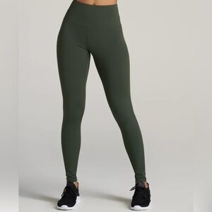 American Tall pine green leggings with a high waist and wide waistband.